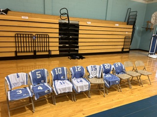 Jerseys on chairs